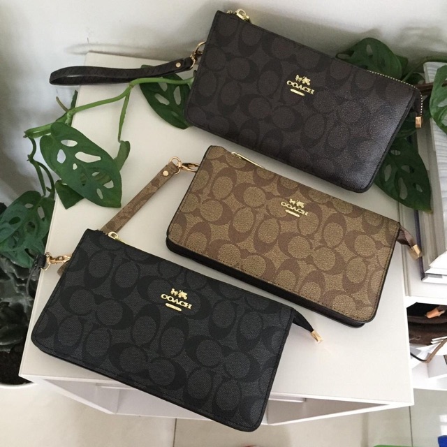 Coach clutch mini bag / clutch coach / clutch import murah / clutch unisex