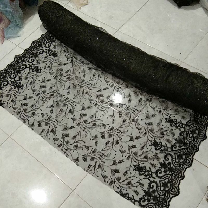 Tile mutiara tumpal Rp 25k