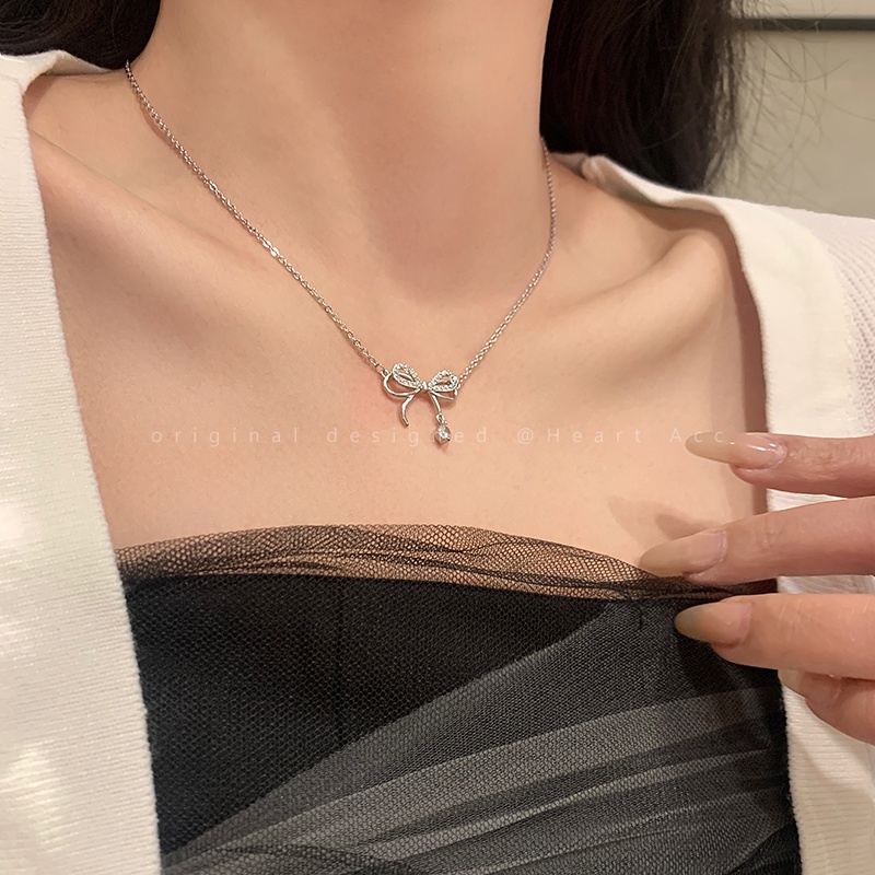 Kalung Rantai Choker Liontin Pita Hias Kristal Warna Silver Untuk Wanita