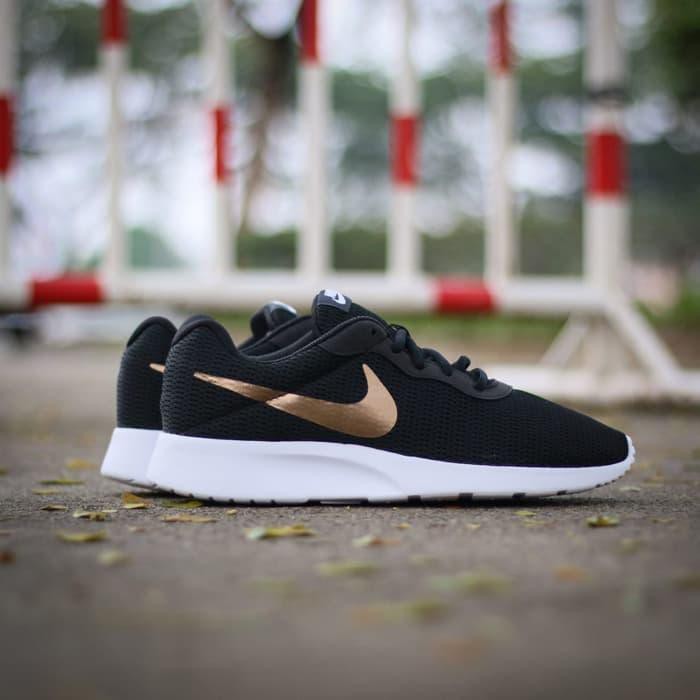 nike tanjun niño negras