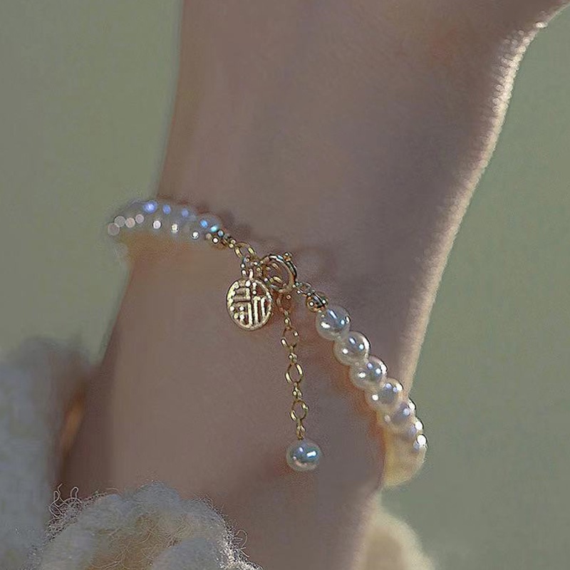 1pc Gelang Mutiara Rumbai Motif Tulisan Untuk Wanita