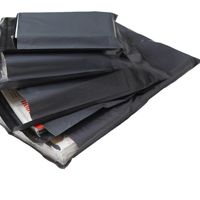 

>_9 ISI 100 lembar PLASTIK ONLINE SHOP + LEM / POLYMAILER TEBAL 28X42 (GROSIR) TERMURAH..!!