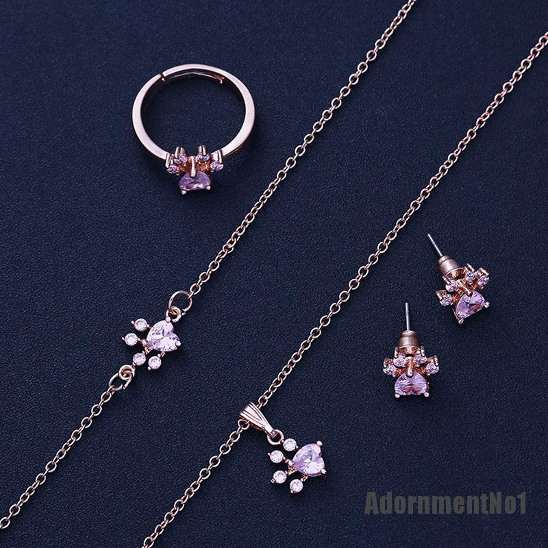 (Adornmentno1) 4pcs / set Kalung + Gelang + Cincin + Anting Tusuk Motif Telapak Kaki Anjing Aksen Kristal Untuk Perhiasan Wanita