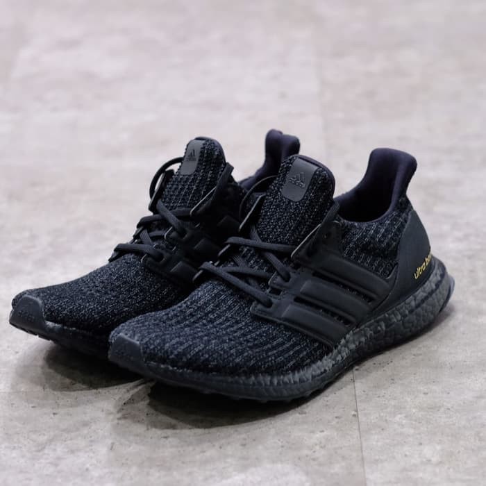 ultra boost triple black gold