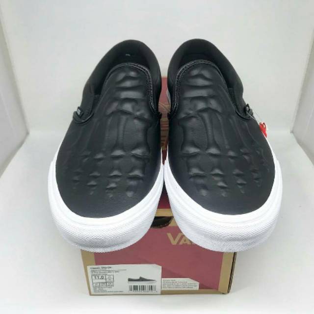 vans slip on x ray bones