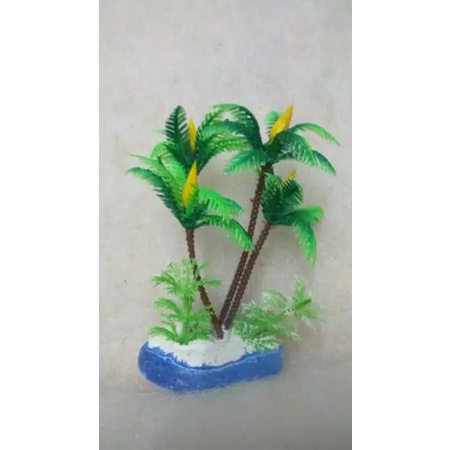 Hiasan aquarium pohon kelapa.