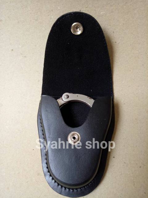 Dompet sarung borgol