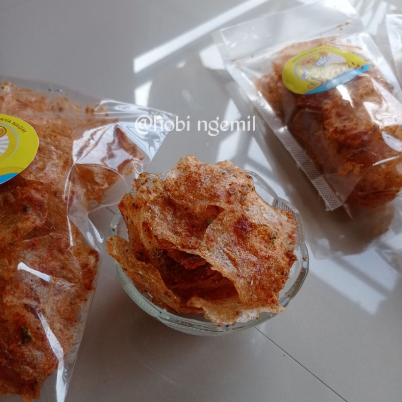 

Keripik Kaca Pedas Daun Jeruk 100gram/pikca Keripik kaca pedas renyah