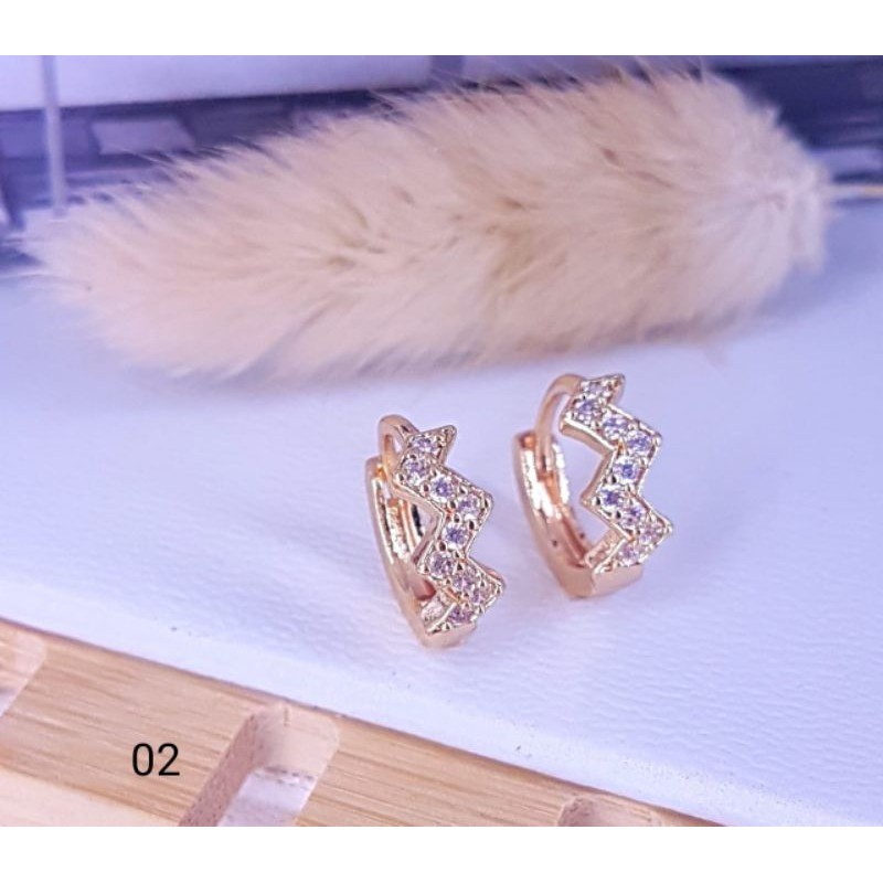 Anting titanium import kode 15 dan salib,awet,tahan lama