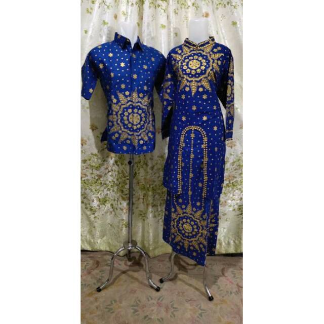Baju pesta motif matahari  songket Palembang