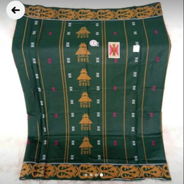 Sarung katun nuansa karo motif kurun tendi