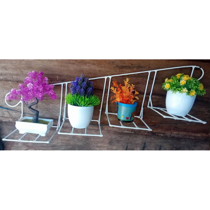 Rak bunga besi dinding