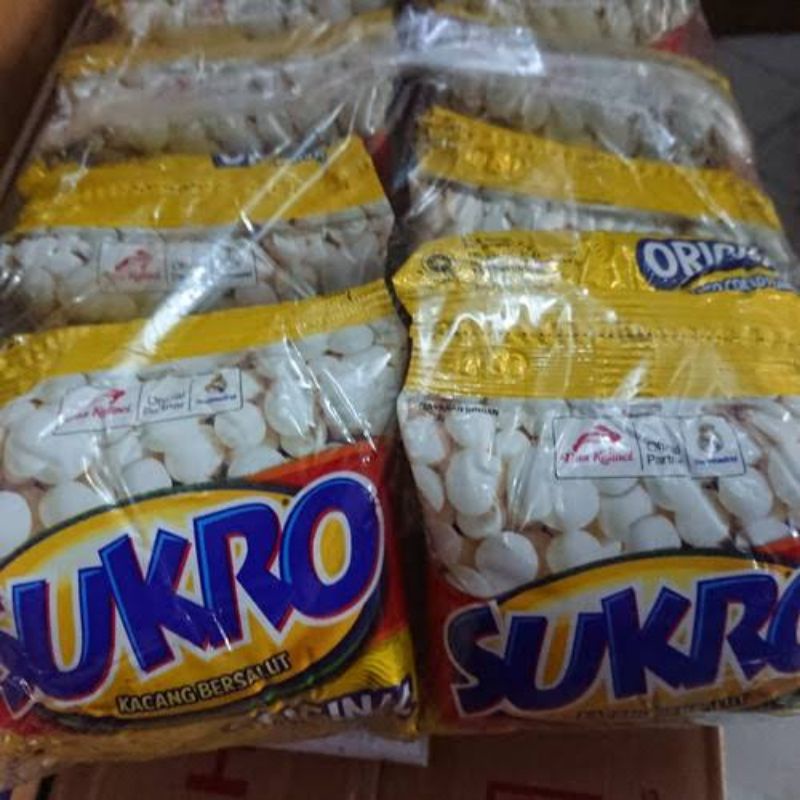 

Sukro dua kelinci kacang makanan jajanan cemilan pilus atom renceng 1000