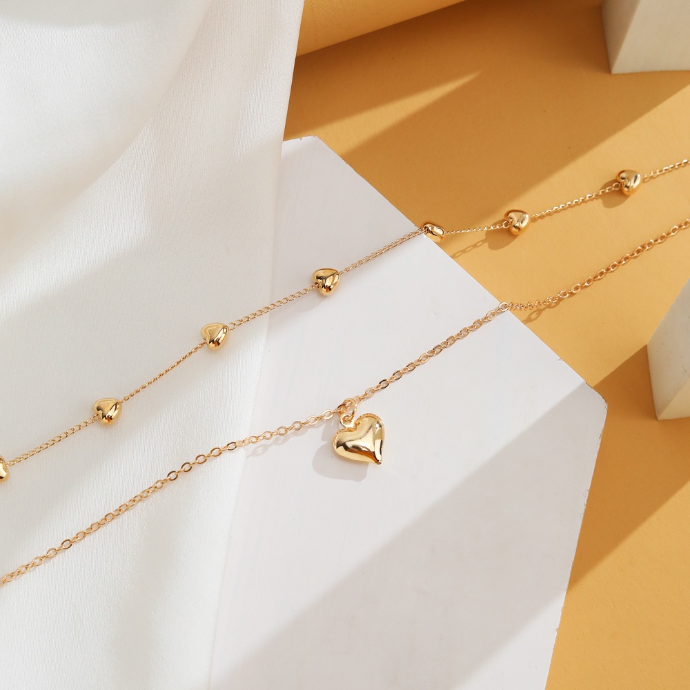 Kalung Rantai Panjang Multilayer Liontin Hati Warna Emas Gaya Bohemia Untuk Wanita