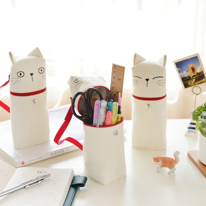 

Versi korea kartun kucing tas pena ekspresi warna solid putaran kanvas pemegang pena