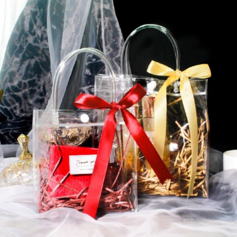 

Goodie Bag Transparan Kancing Goodie Bag PVC Transparan Hampers Bag