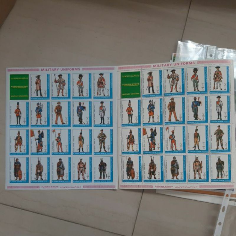 

Perangko Ajman Military Uniform perforation & imperf 2 sheet 38 prangko