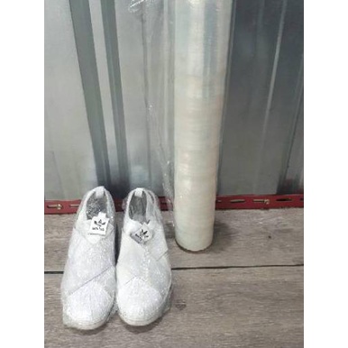 Plastik Pembungkus Sepatu untuk Proses Unyellowing - wrapping koper stroller