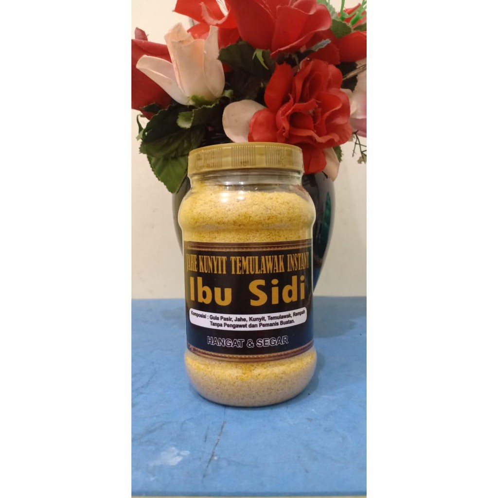 

Sari Herbal Instant Jakute (Jahe Kunyit Temulawak) Ibu Sidi Toples 325gr Minuman Herbal