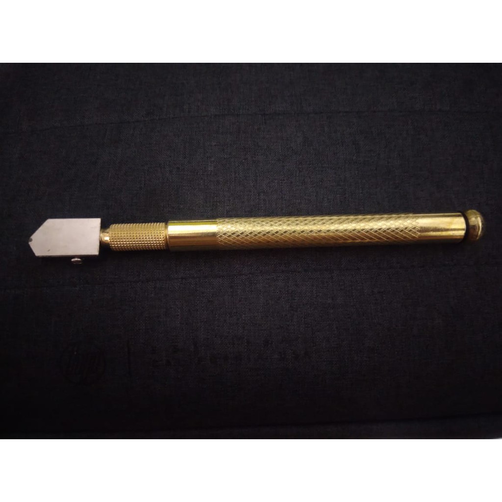 Alat pemotong kaca dan keramik