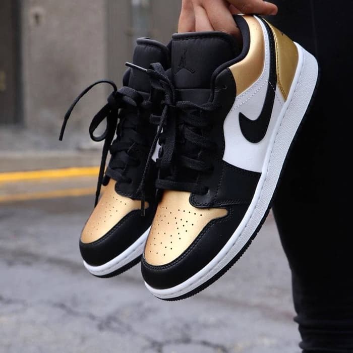 gold and black jordan 1 low