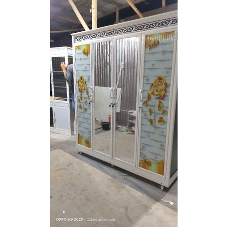 lemari / almari baju kaca alumunium / lemari pakaian alumunium motif