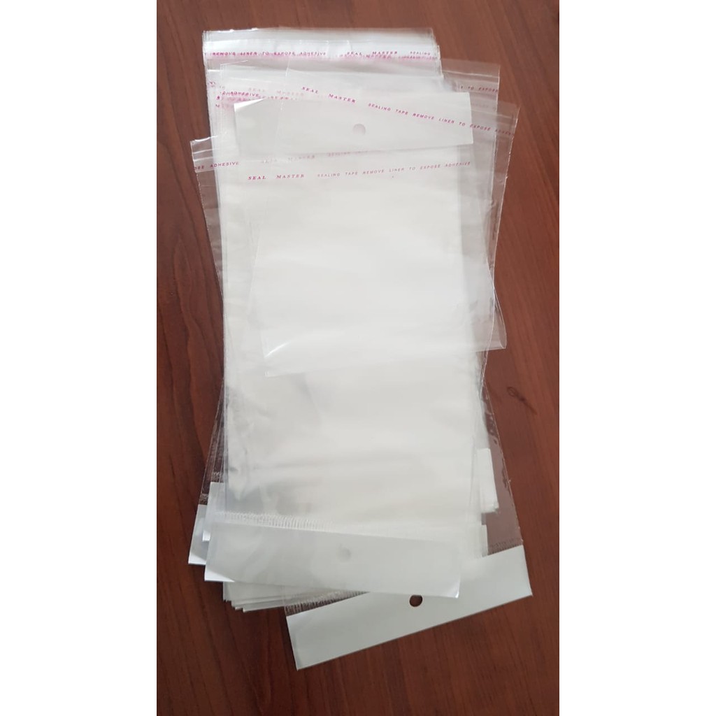 Cs PLASTIK PACKINGAN PLASTIK PACKING KEMASAN PLASTIK CASE ACCESORIES KLIP UK 11 X 23 ISI 100PCS