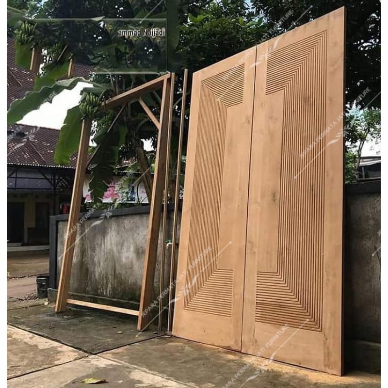 Pintu utama kupu tarung minimalis modern kayu jati tpk jepara