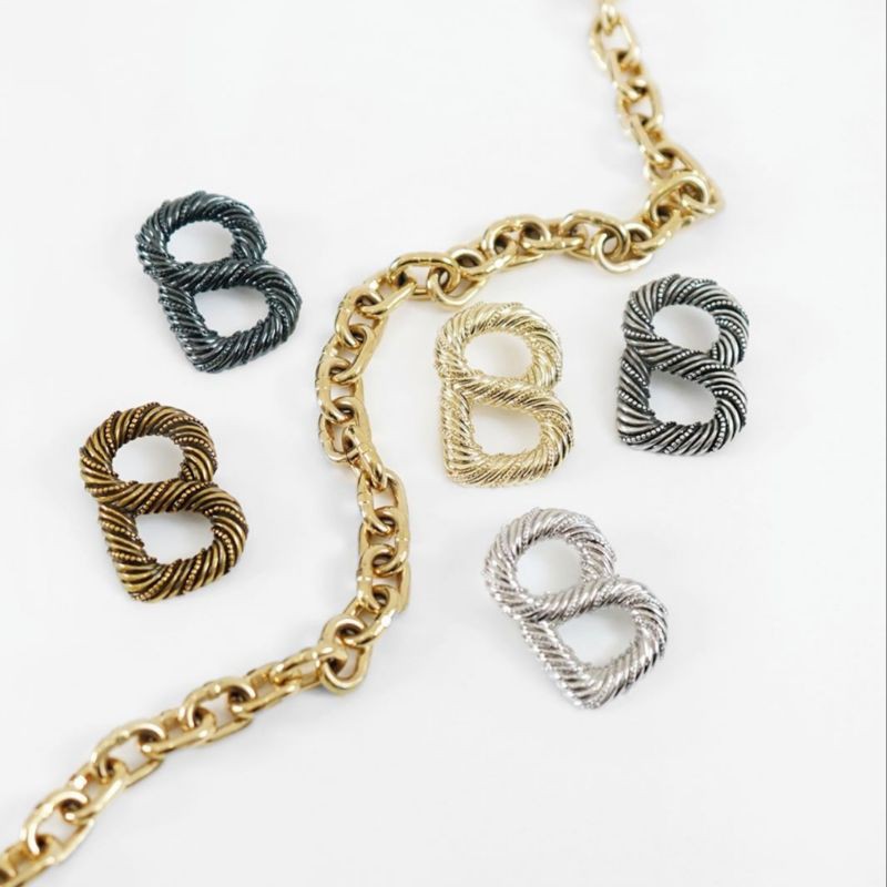 buttonscarves signature swirled brooch GOLD