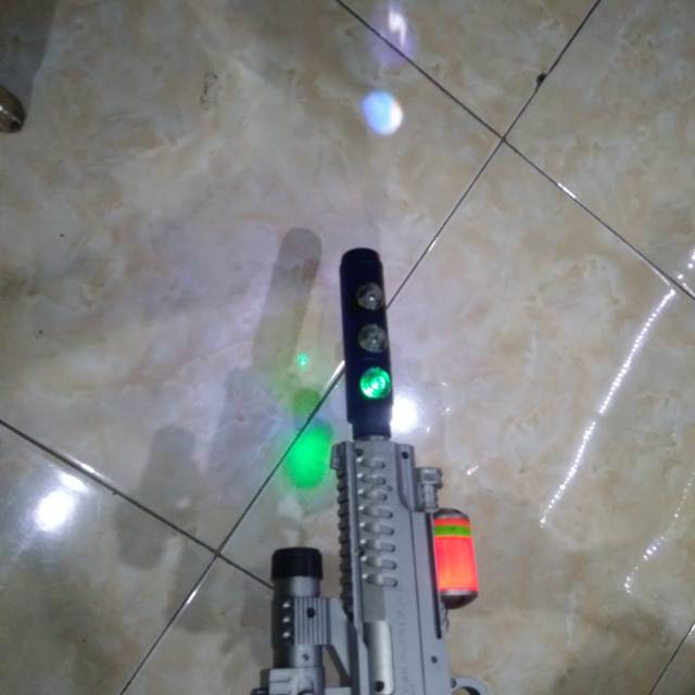 Tembak motif pistol FN