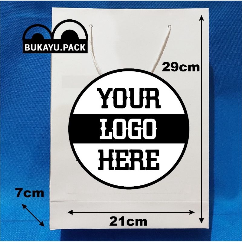 

Paperbag kertas Sablon Custom /duplex putih 150gr ukuran 21x7x29cm