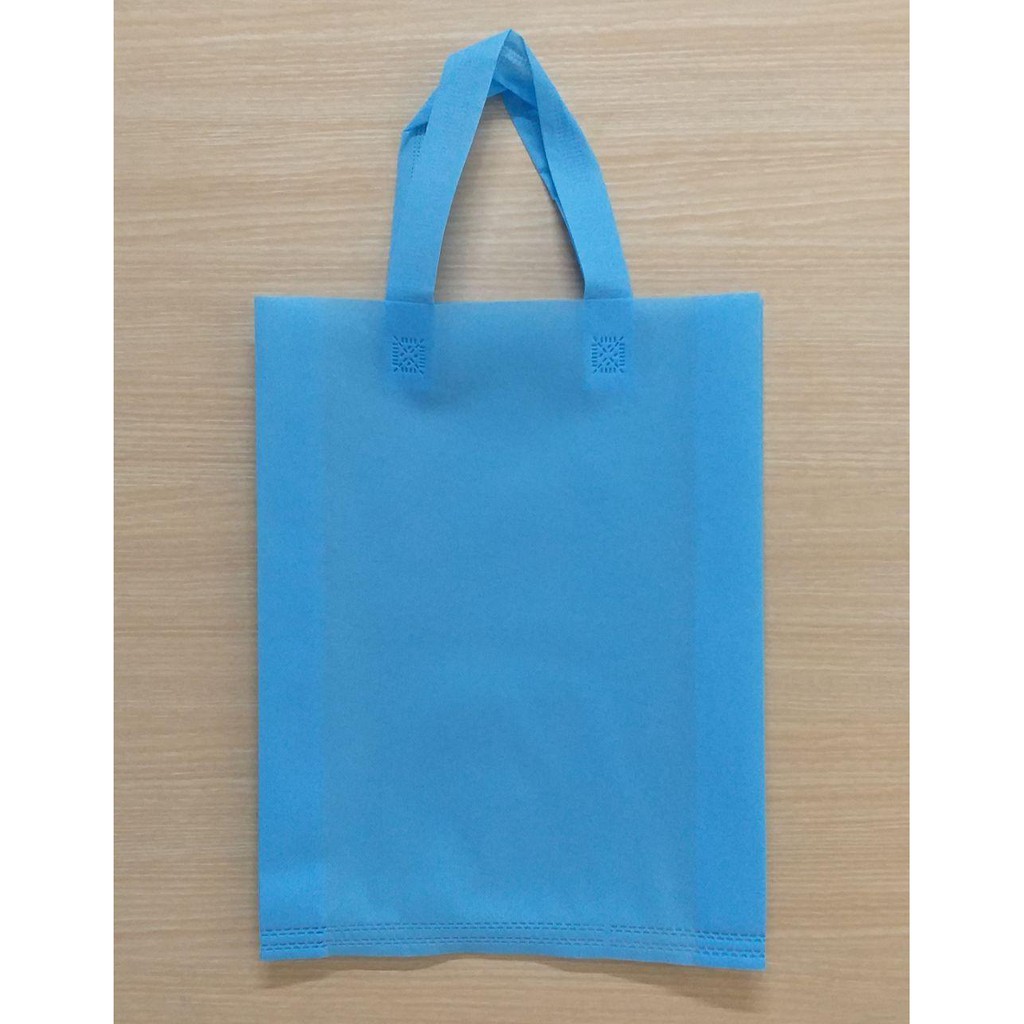 

GOODIE BAG 30X40 MURAH / SPUNBOND HANDLE / Tas Belanja MURAH / Tas Souvenir (Warna Biru Muda)