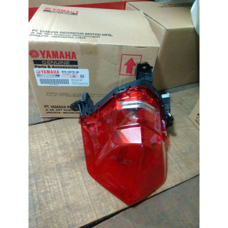 Lampu stop belakang X ride 125 originalLAMPU BELAKANG LAMPU STOP X RIDE 125 ORIGINAL YGP