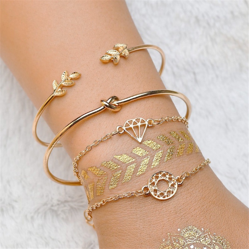 4pcs / Set Gelang Rantai Bentuk Daun Simpul Warna Rose Gold Untuk Wanita