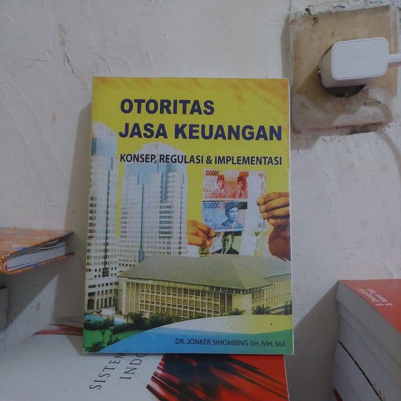 

otoritas jasa keuangan jonker sihombing