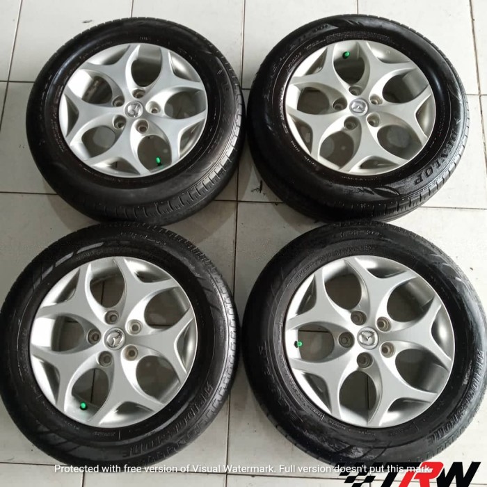 velg mobil second copotan original Mazda Biante Ring 16 ban Dunlop 205 60 R16