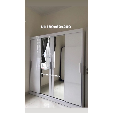 Lemari 4 pintu sliding MDF HPL 180