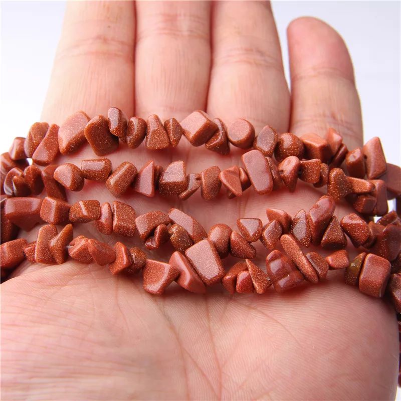 Manik-manik batu hancur alami kristal tidak teratur batu pecah pasir emas coklat