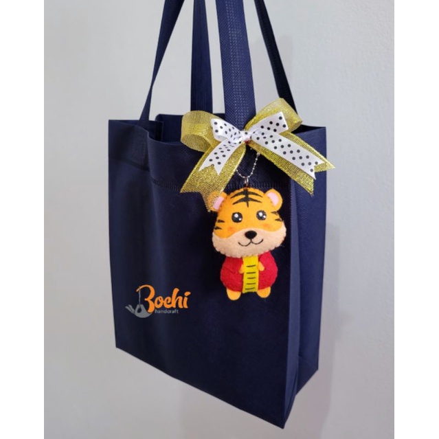 

Tas hamper imlek / Tas souvenir / tas spunbond / bingkisan imlek