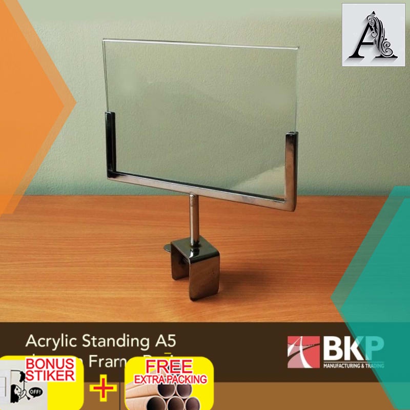 

Grosir Acrylic Stand Uk. A5 - Display Harga Akrilik - Sistem Jepit Putar Besi