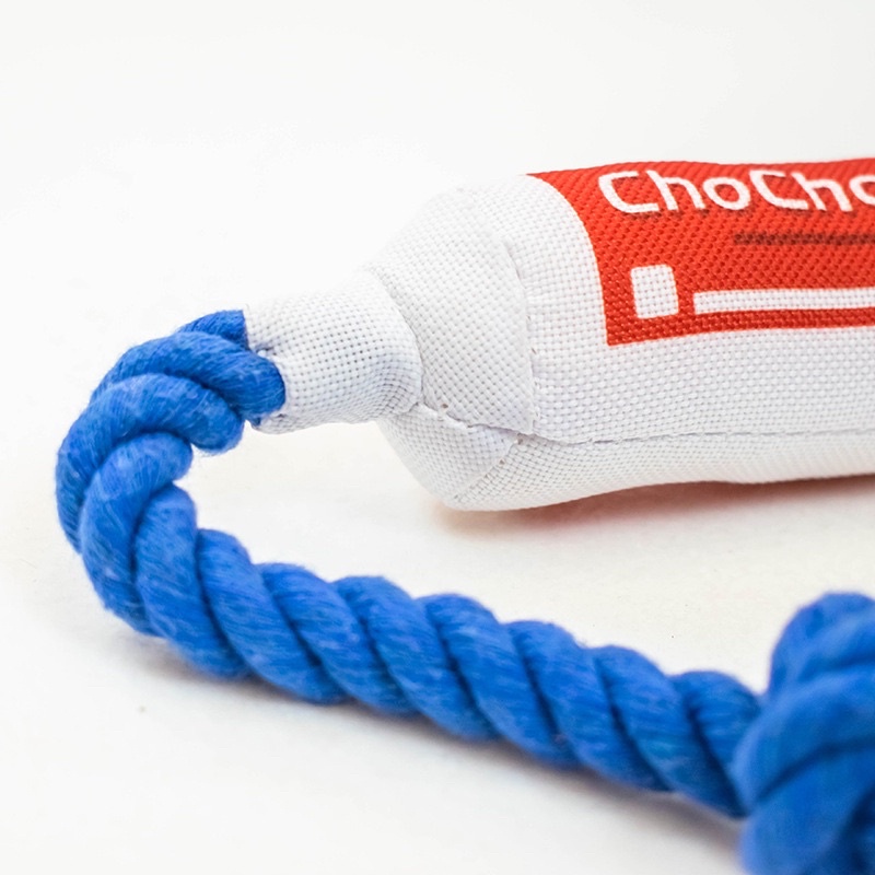 Chocho dog toothpaste squeaky toy with rope