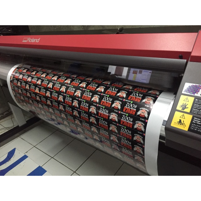 

CETAK STIKER VINYL LABEL KEMASAN METERAN LAMINATING PLUS CUTTING POTONG POLA DESAIN