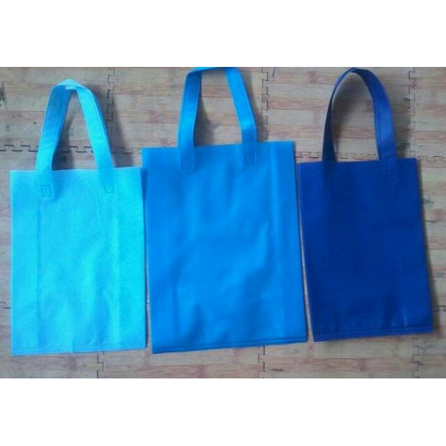

GOODIE BAG TAS SPUNBOND LIPAT SAMPING GROSIR (WEDDING, ULANG TAHUN, HAMPERS, KANTOR, ONLINE SHOP)
