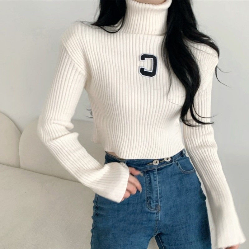 Sweater turtleneck pendek wanita 2021 musim dingin desain baru pakaian rajut niche gaya Barat kemeja