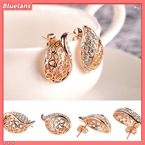 Bluelans 1 Pasang Anting Tusuk Desain Daun Hollow Hias Berlian Imitasi Warna Emas Untuk Wanita