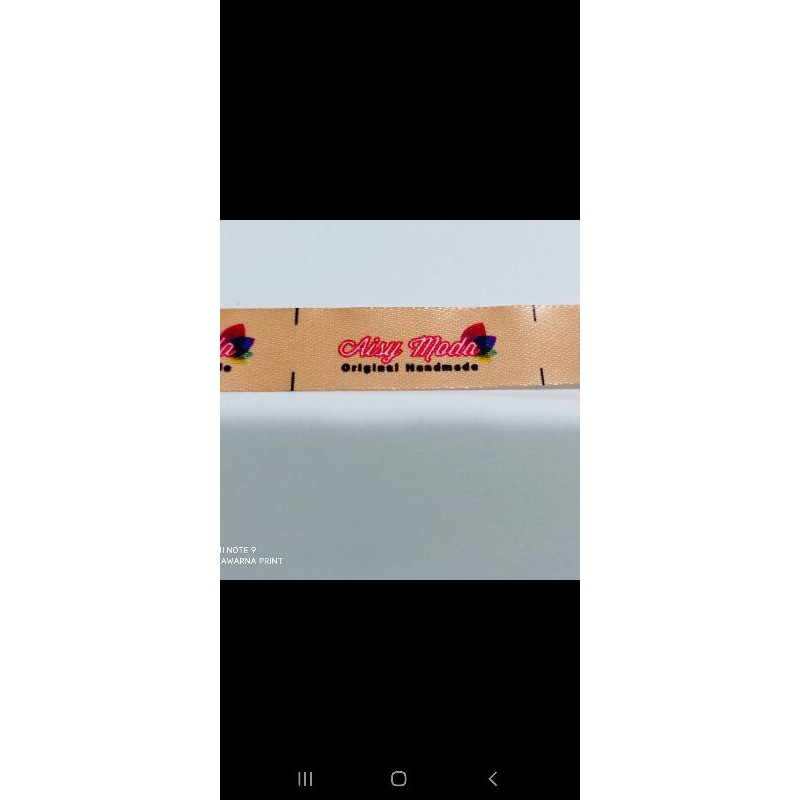 

Cetak pita label baju hijab satin meteran full color printing custom surabaya
