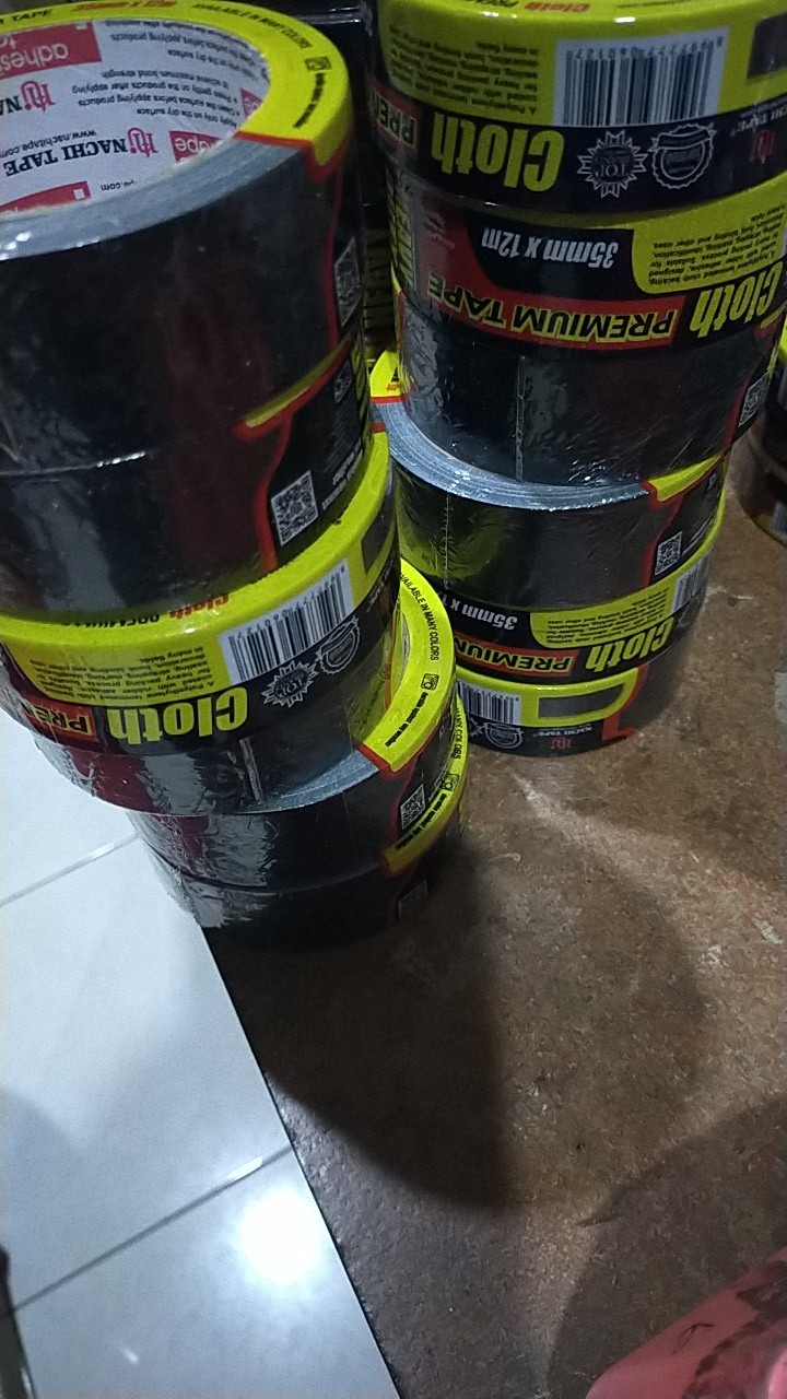 Lakban Kain Hitam Isolasi Tape Nachi 1 X 12 Meter (23 Mm X 12 Meter)
