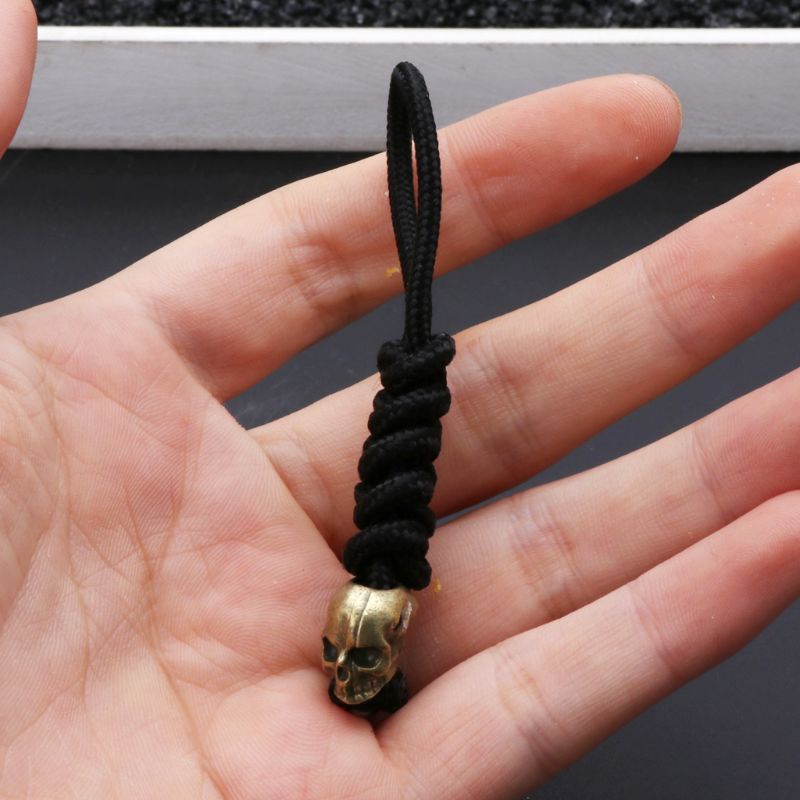 SIY  Skeleton Skull Pendant Woven Rope Umbrella Mountaineer Survival Key Chain Unisex