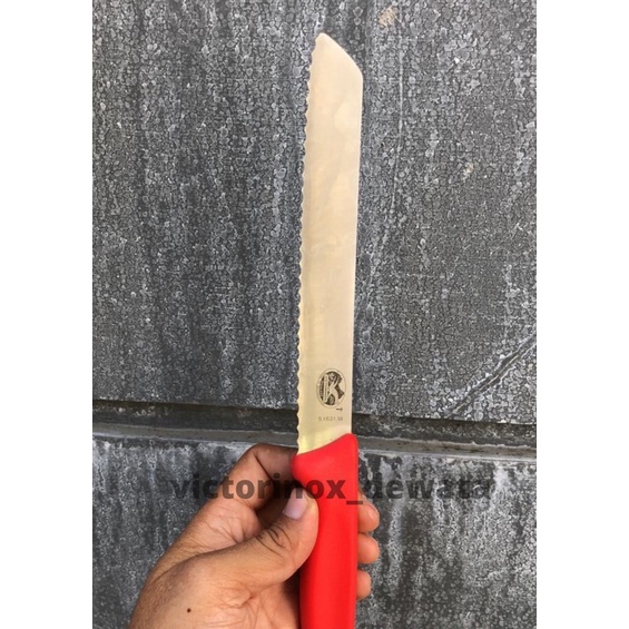 victorinox bread /pisau roti cap payung with red nylon handle 5.1631.18