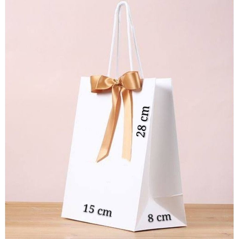 

BEST PROMO PAPERBAG PEARL WHITE SPECIAL 15 X 8 X 28 cm